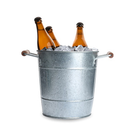 Photo of Metal bucket with bottles of beer and ice cubes isolated on white