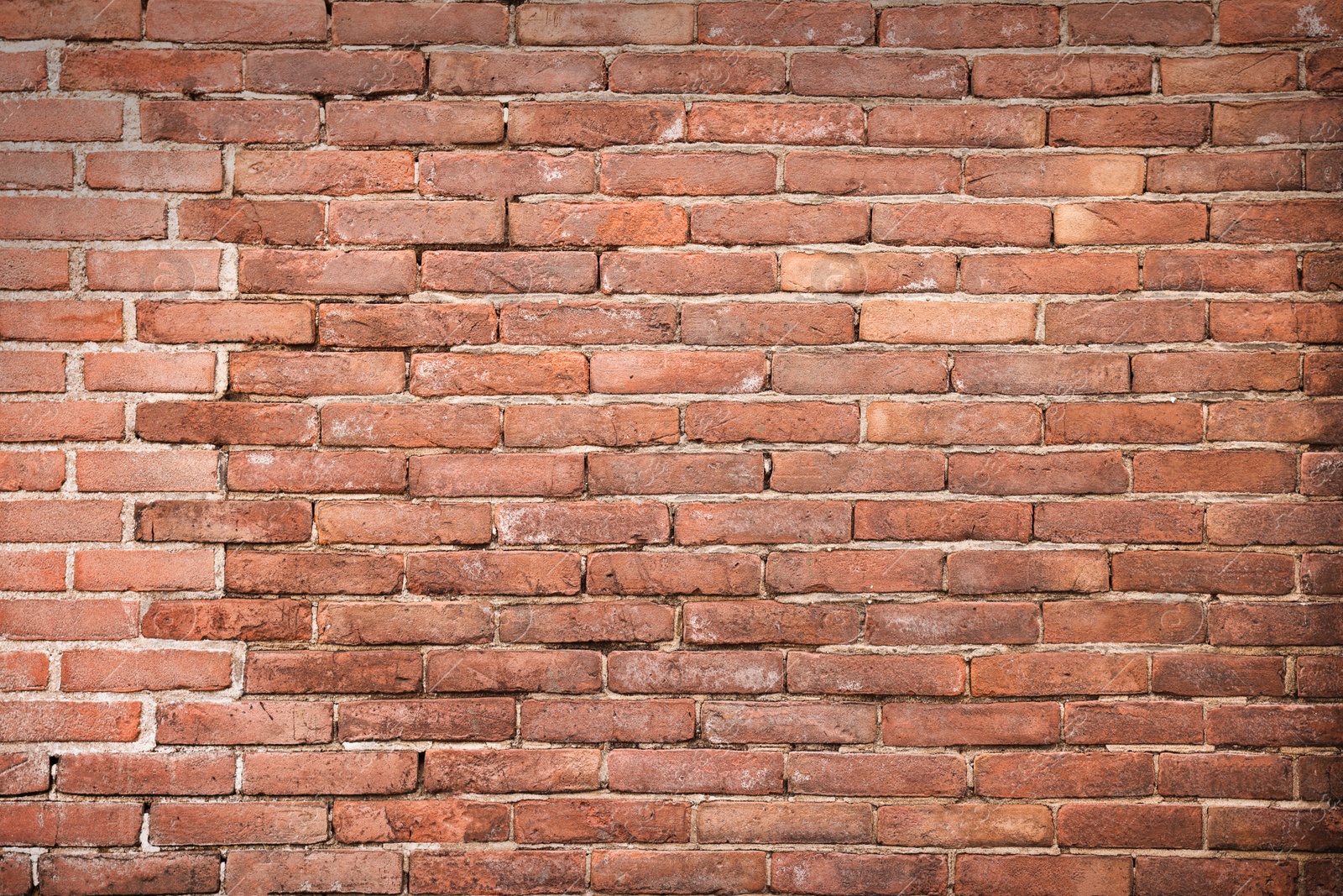 Photo of Texture of old red brick wall as background