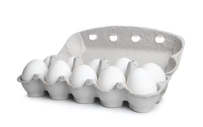 Photo of Box with chicken eggs isolated on white