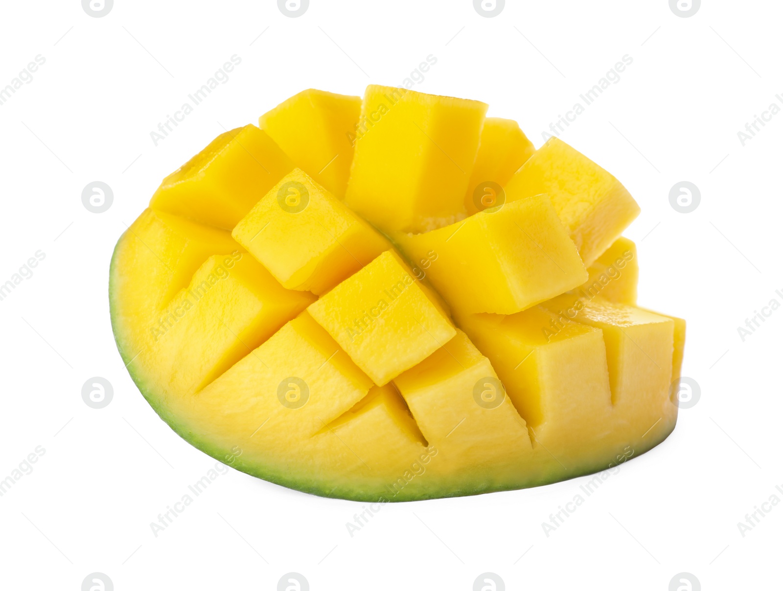 Photo of Half of ripe mango cut into cubes isolated on white