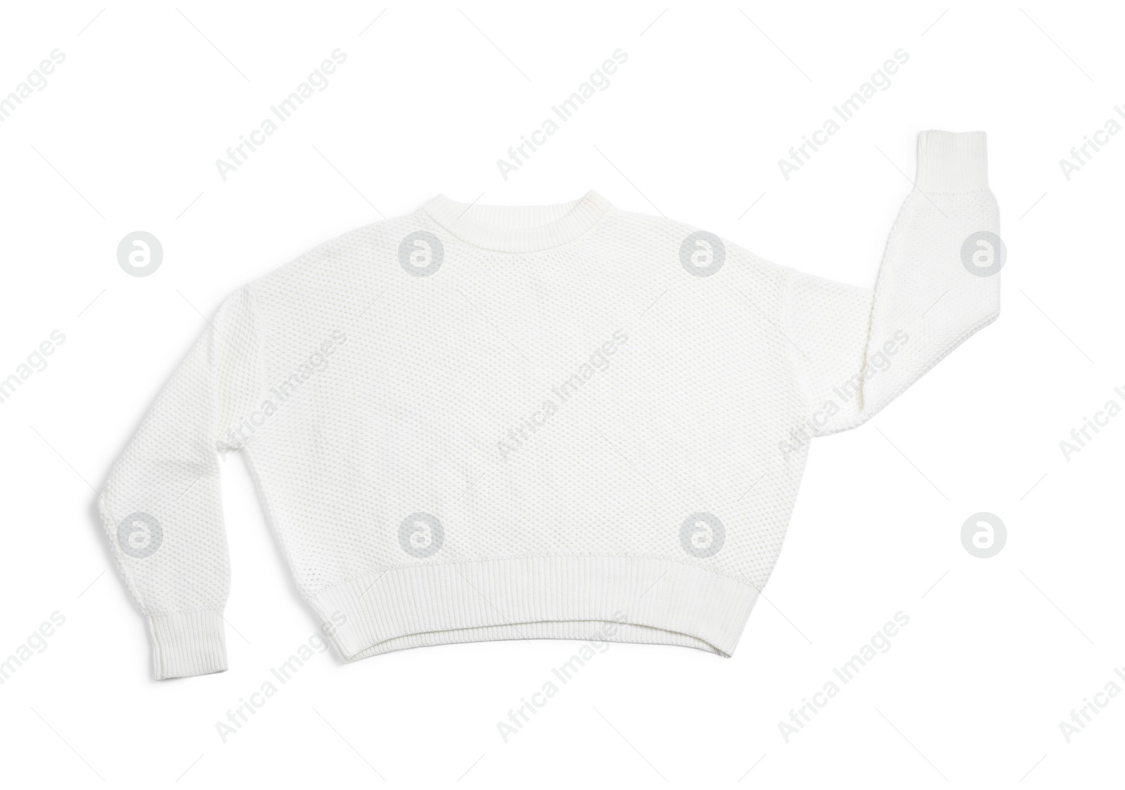 Photo of Warm knitted sweater on white background, top view