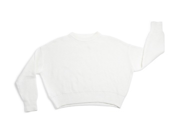 Warm knitted sweater on white background, top view