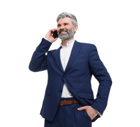 Mature businessman in stylish clothes posing on white background, low angle view