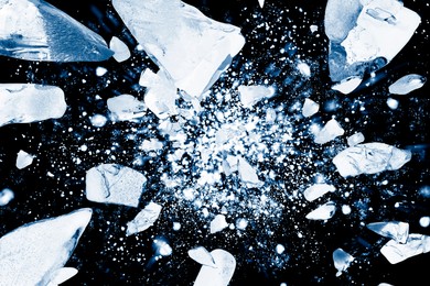 Image of Crushed ice in air on black background