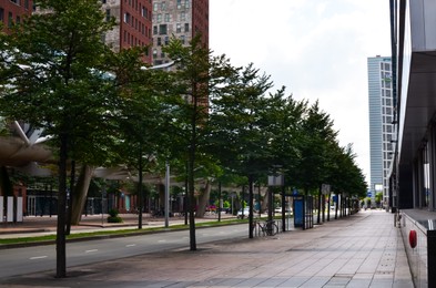 Beautiful view of city street with buildings on sunny day