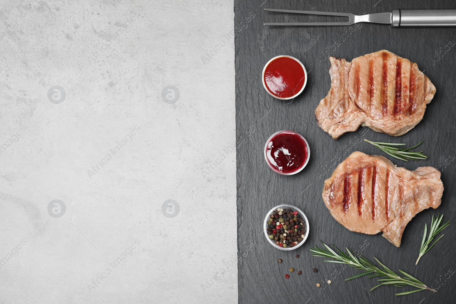 Photo of Flat lay composition with grilled meat on slate plate, space for text