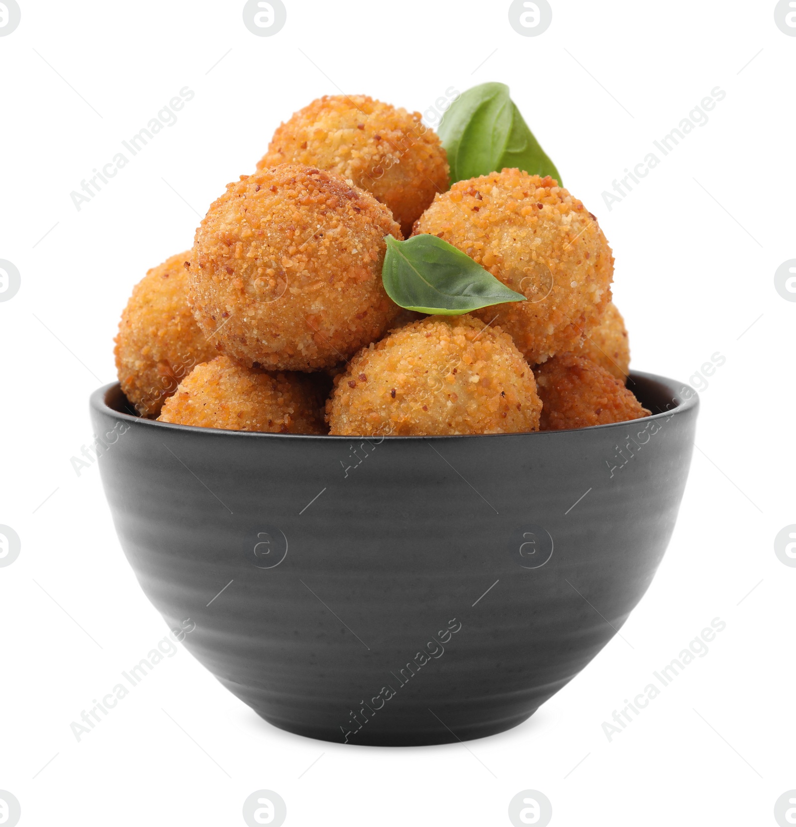 Photo of Bowl with delicious fried tofu balls and basil on white background