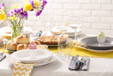 Festive Easter table setting with traditional meal at home