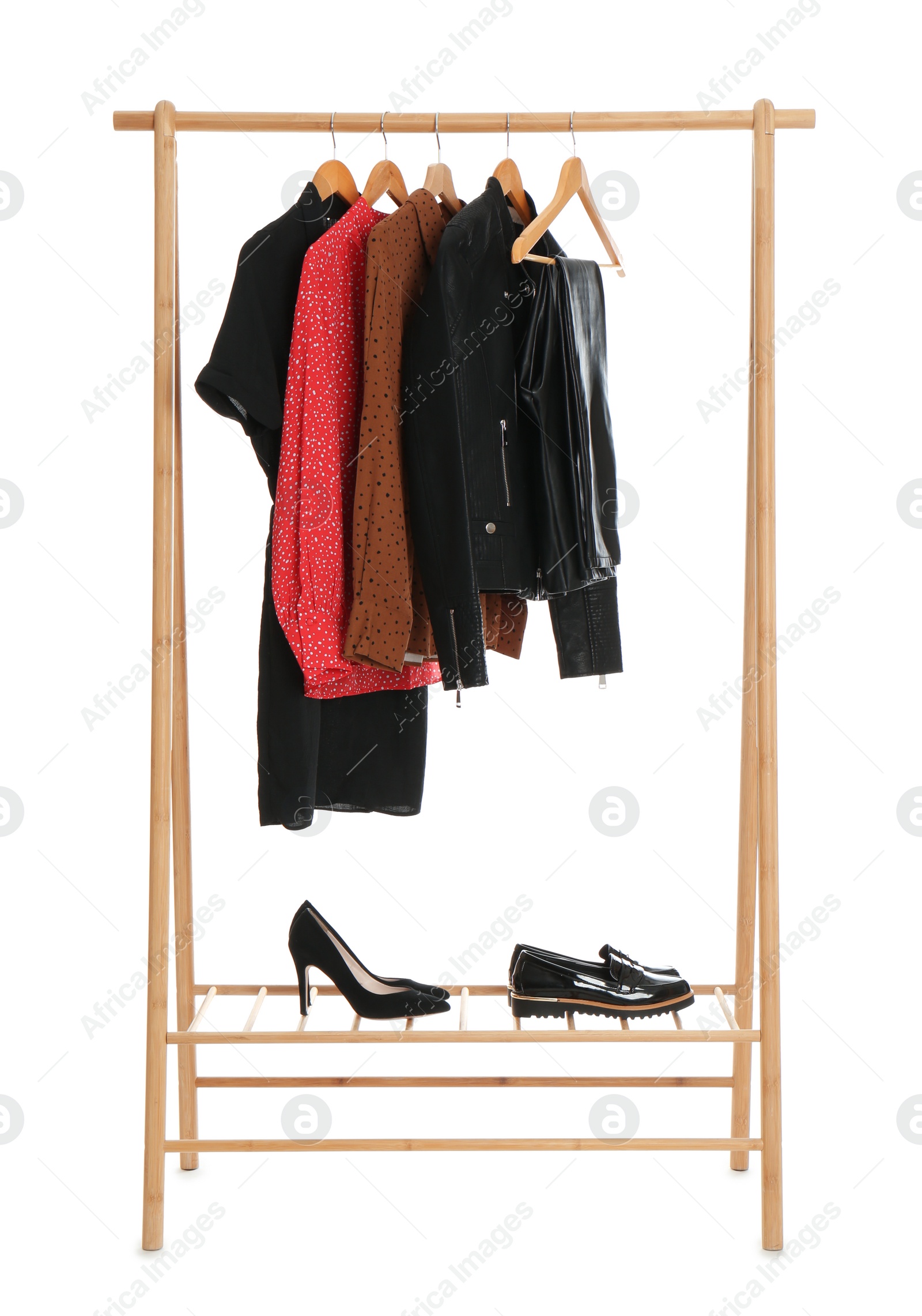 Photo of Rack with stylish clothes isolated on white