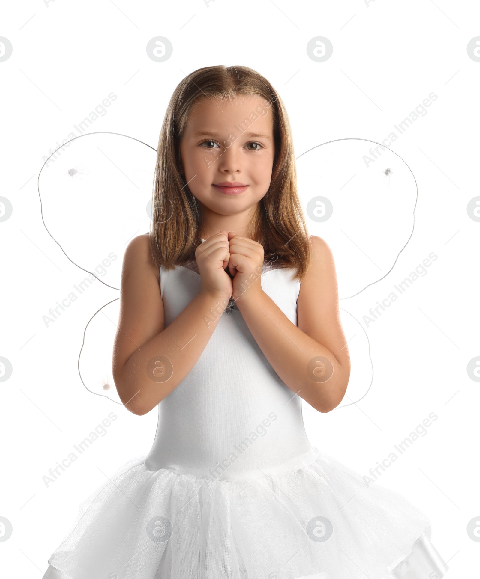Photo of Cute little girl in fairy costume with wings on white background