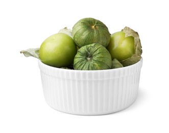 Bowl of fresh green tomatillos with husk isolated on white