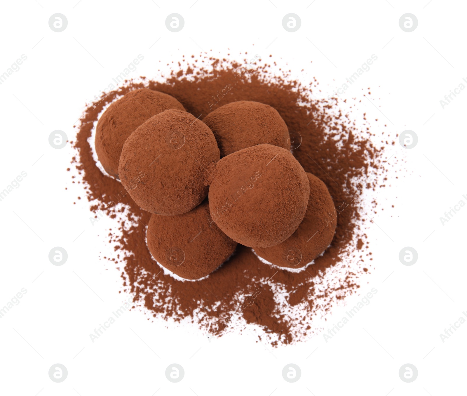 Photo of Delicious chocolate truffles powdered with cocoa on white background, top view