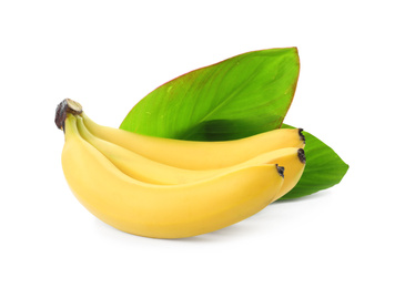 Photo of Cluster of delicious ripe bananas and green leaves isolated on white