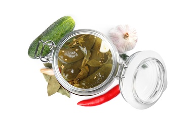 Jar with pickled cucumbers on white background, top view