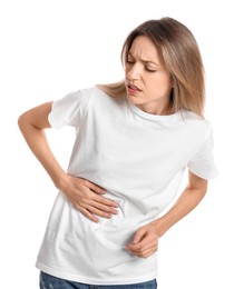 Young woman suffering from liver pain on white background