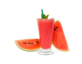 Glass of tasty watermelon drink with mint and cut fresh fruit isolated on white