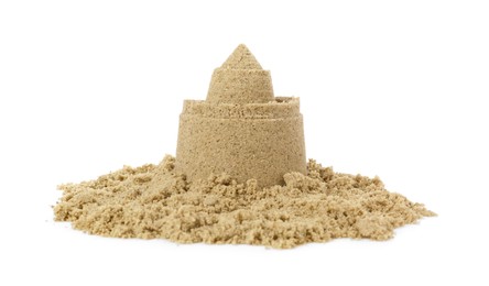 Photo of Pile of sand with beautiful castle isolated on white