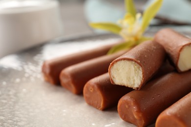 Photo of Glazed curd cheese bars on plate, closeup