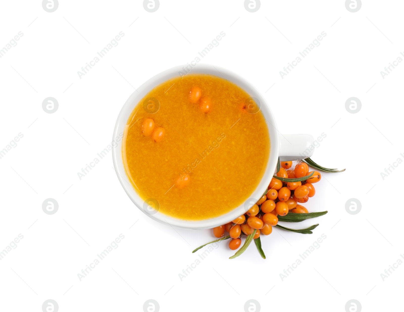 Photo of Sea buckthorn tea and fresh berries isolated on white, top view