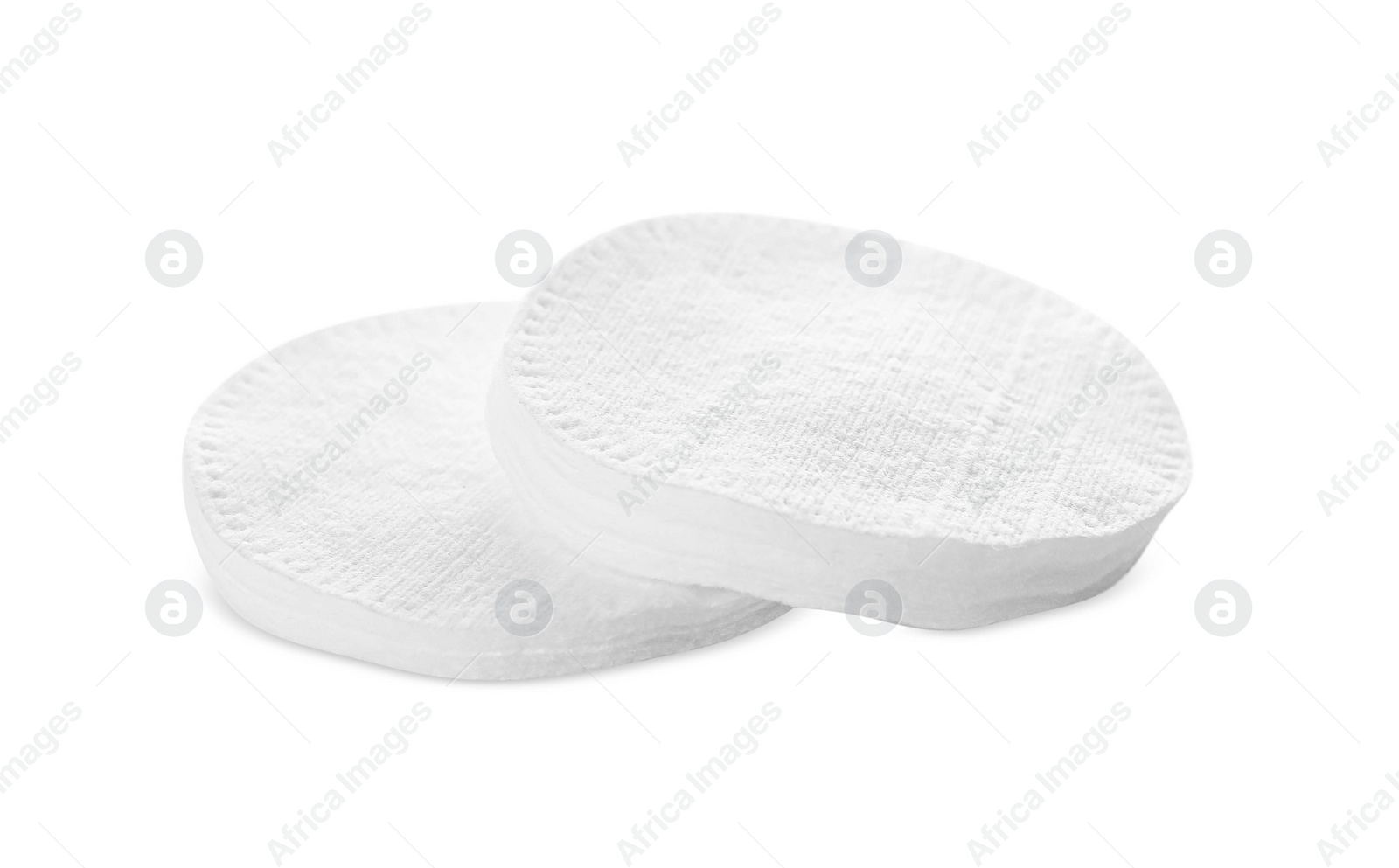 Photo of Pile of cotton pads on white background