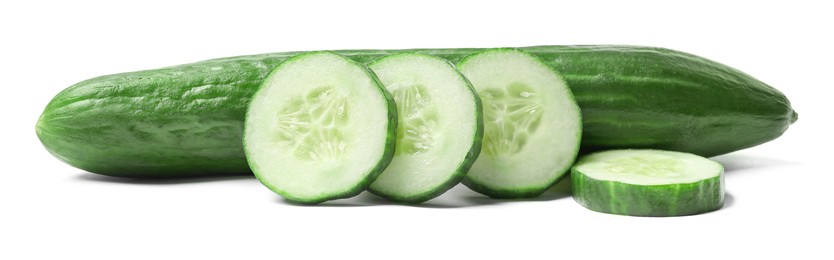Photo of Whole cucumber and pieces of one isolated on white