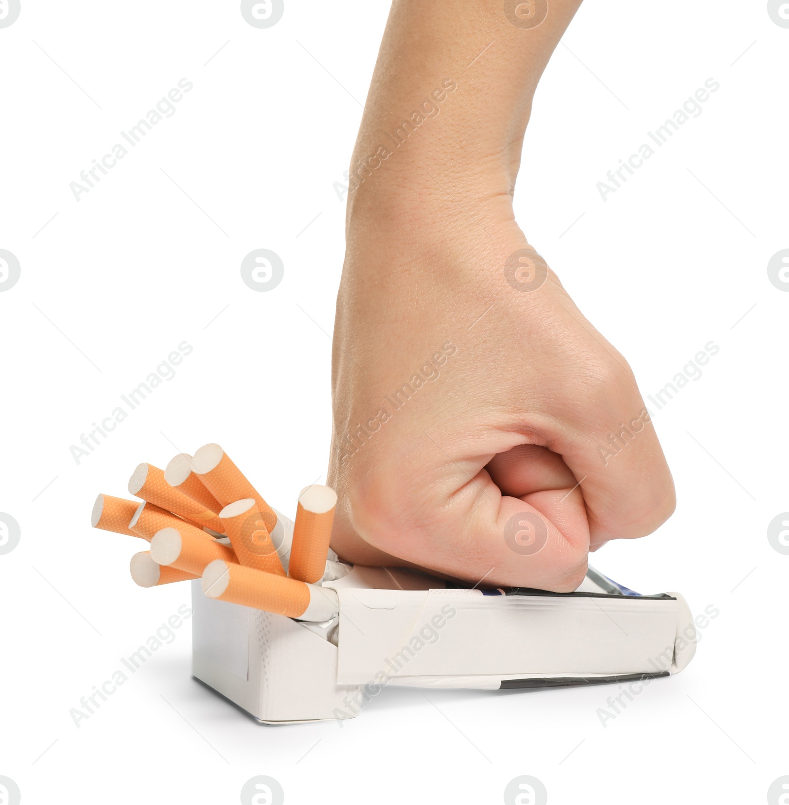 Photo of Stop smoking. Man crushing pack with cigarettes on white background, closeup