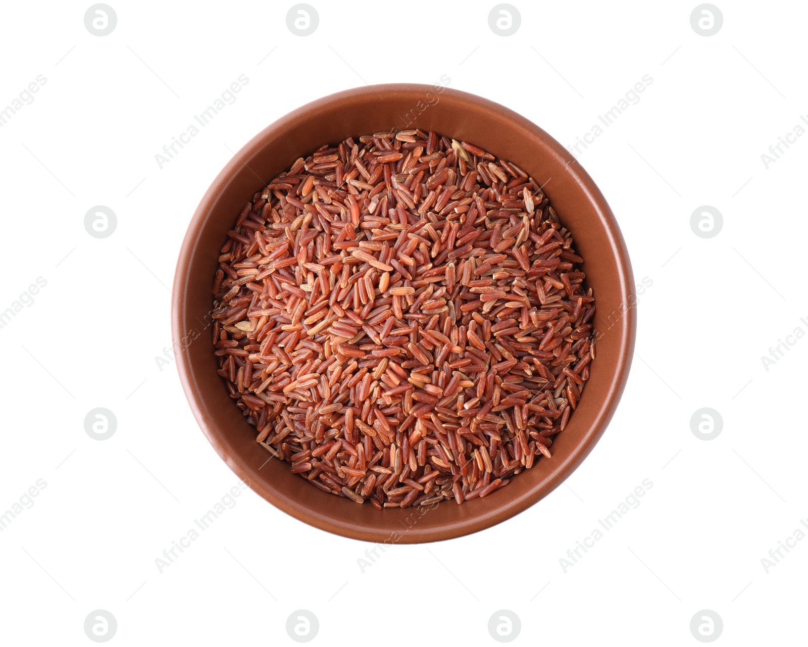 Photo of Brown rice in bowl isolated on white, top view