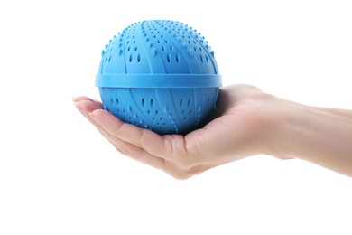 Woman holding blue dryer ball for washing machine isolated on white, closeup