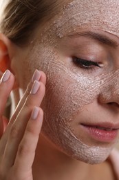 Woman with face mask, closeup. Spa treatments