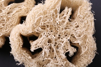 Natural loofah sponges as background, closeup view