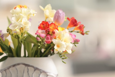 Photo of Beautiful bouquet of freesia flowers, closeup