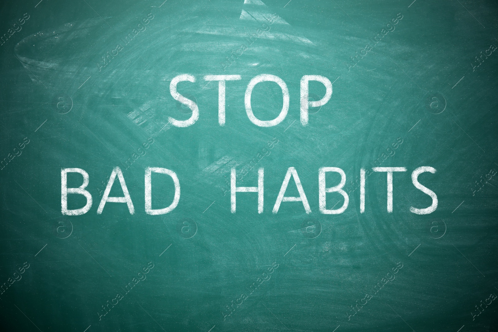 Image of Phrase Stop Bad Habits on green chalkboard