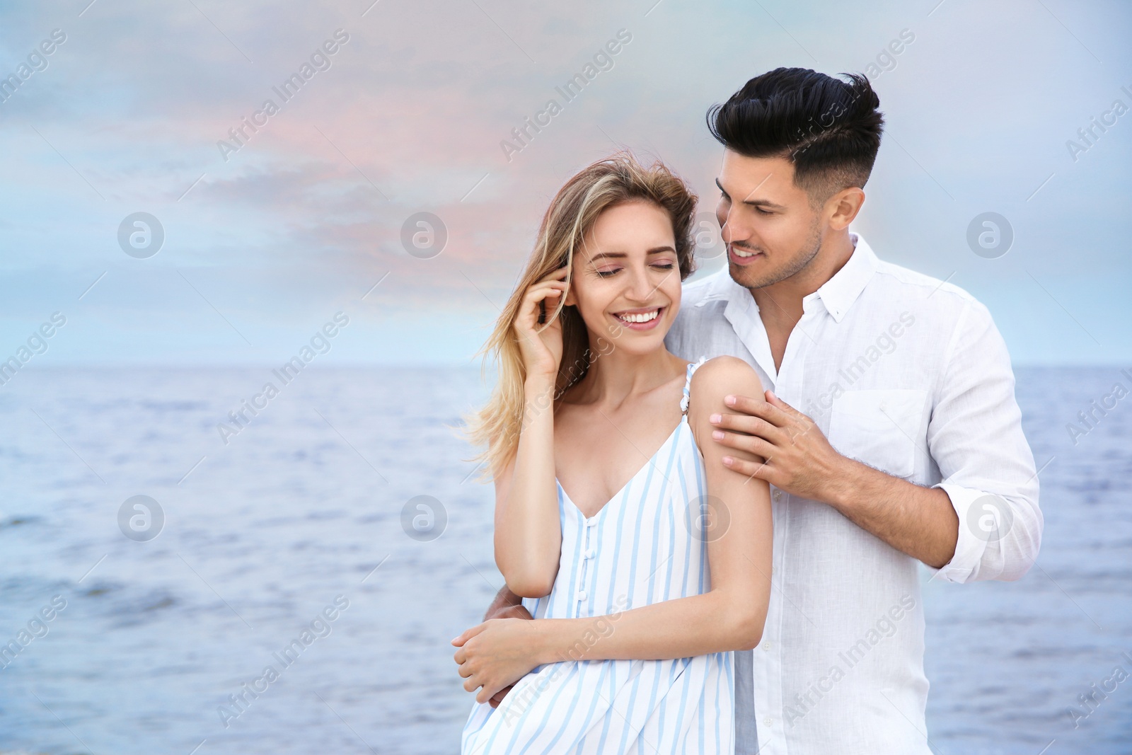 Photo of Happy couple on beach, space for text. Romantic walk