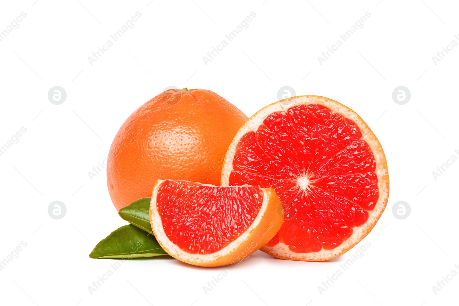 Photo of Whole and cut ripe grapefruits isolated on white