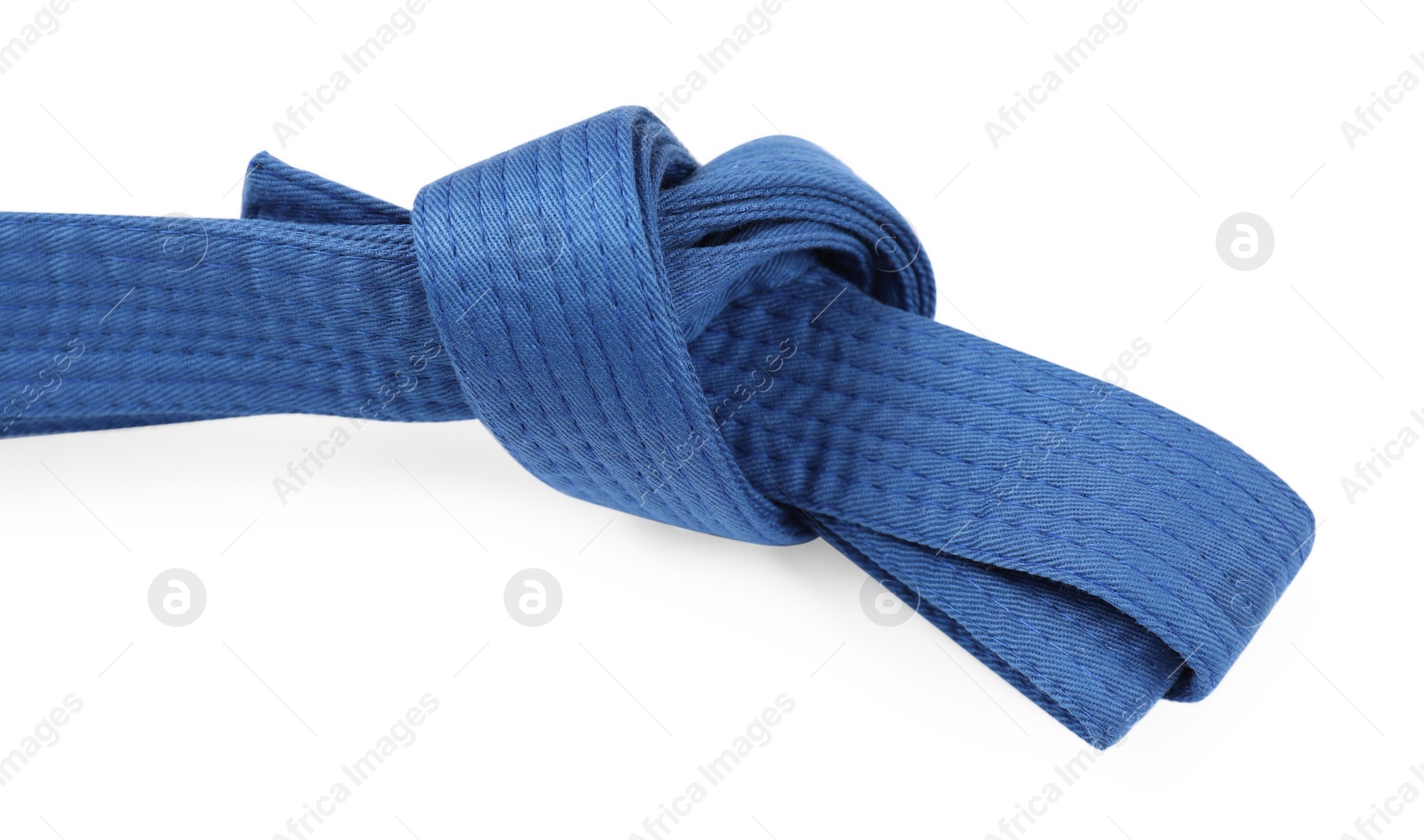 Photo of Blue karate belt isolated on white. Martial arts uniform