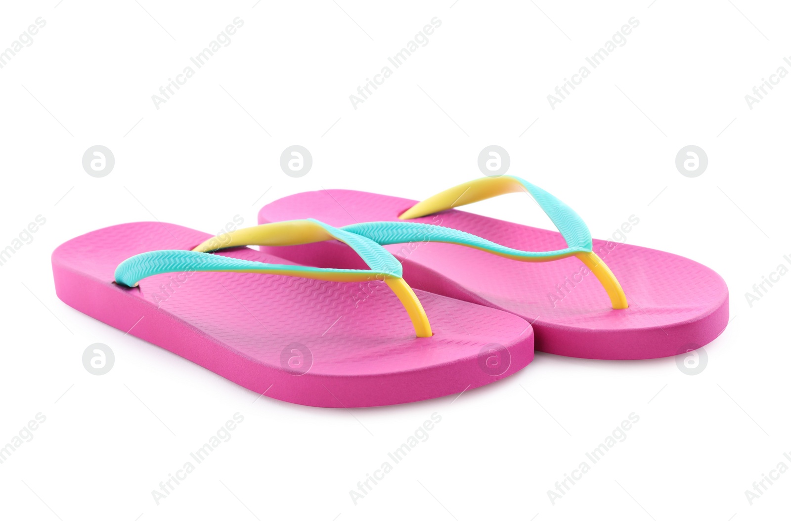 Photo of Pair of stylish pink flip flops isolated on white. Beach object