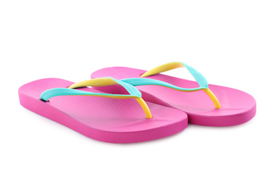 Photo of Pair of stylish pink flip flops isolated on white. Beach object