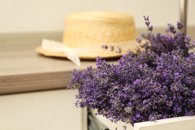 Photo of Beautiful fresh lavender flowers in drawer, closeup