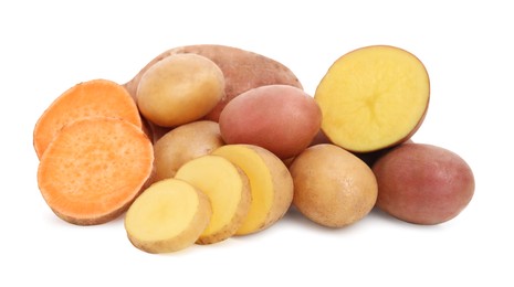 Different types of fresh potatoes on white background