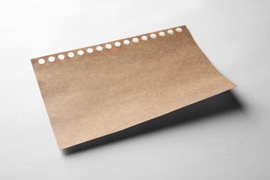 Brown sheet of paper on white background