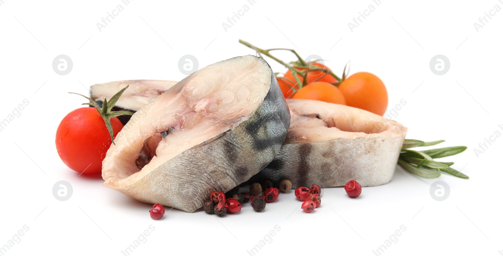Photo of Pieces of mackerel fish with cherry tomatoes, rosemary and spices on white background
