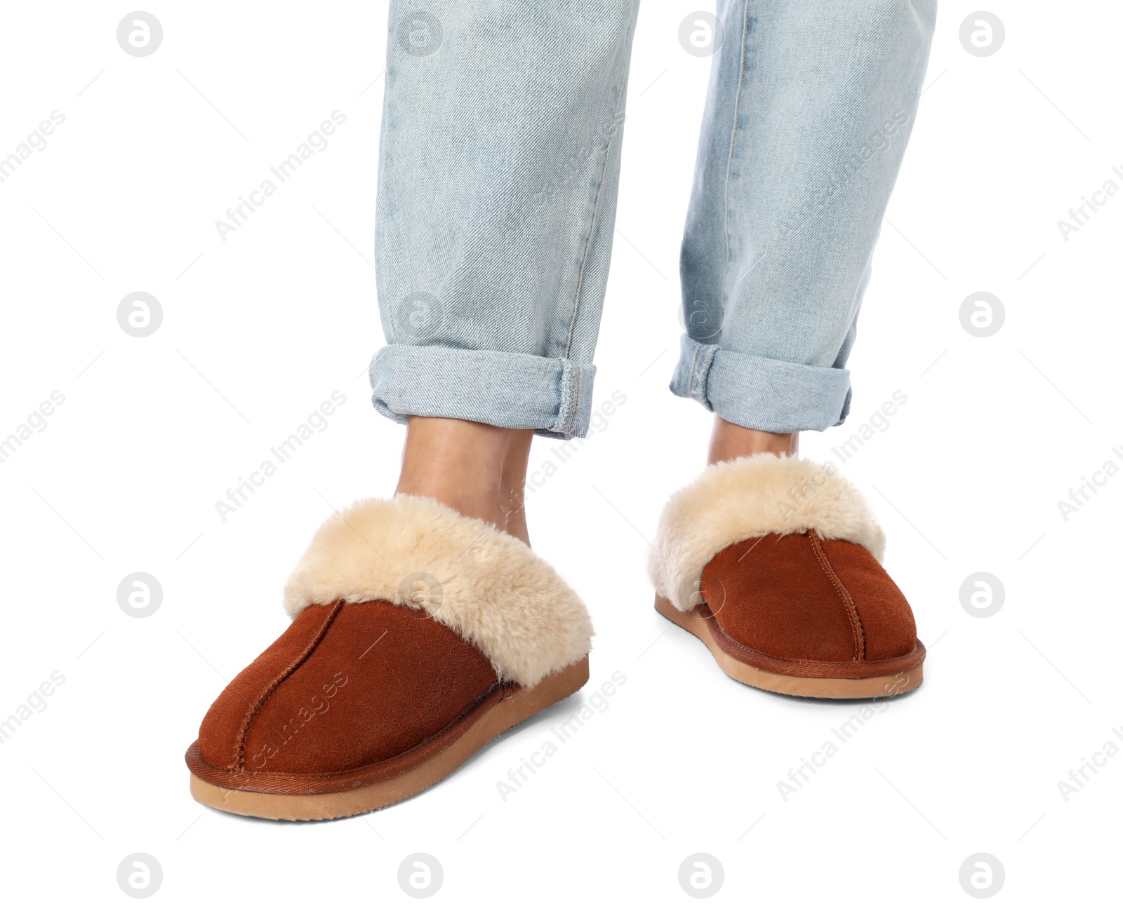 Photo of Woman in soft slippers on white background, closeup