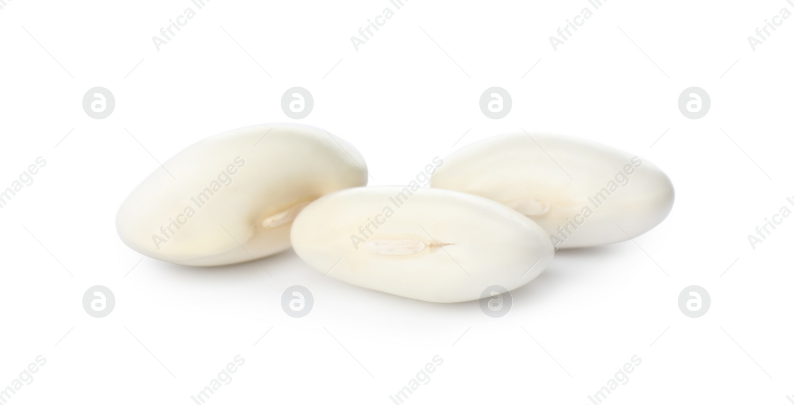 Photo of Three uncooked navy beans on white background