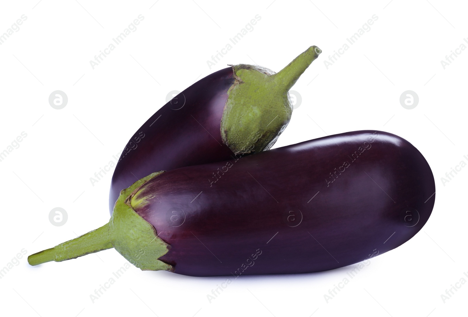 Photo of Organic fresh ripe eggplants on white background