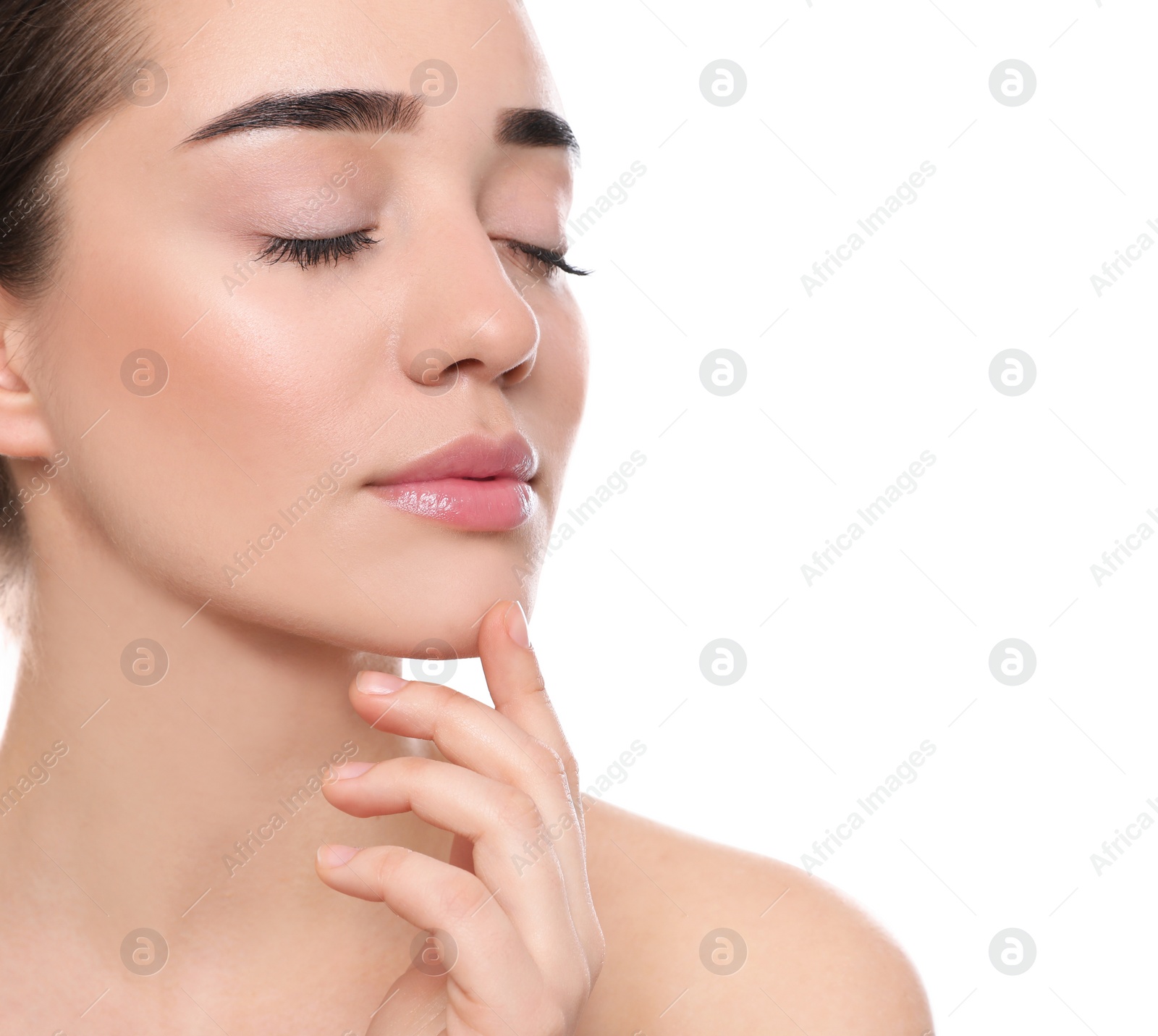 Photo of Portrait of young woman with beautiful face against white background