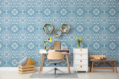 Image of Modern room interior with furniture near patterned wallpapers