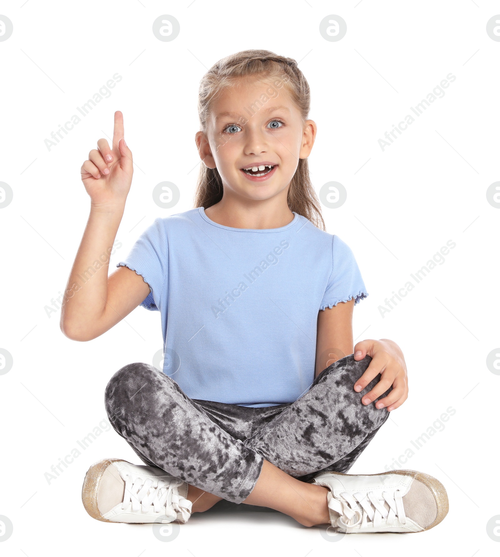 Photo of Portrait of adorable little girl on white background