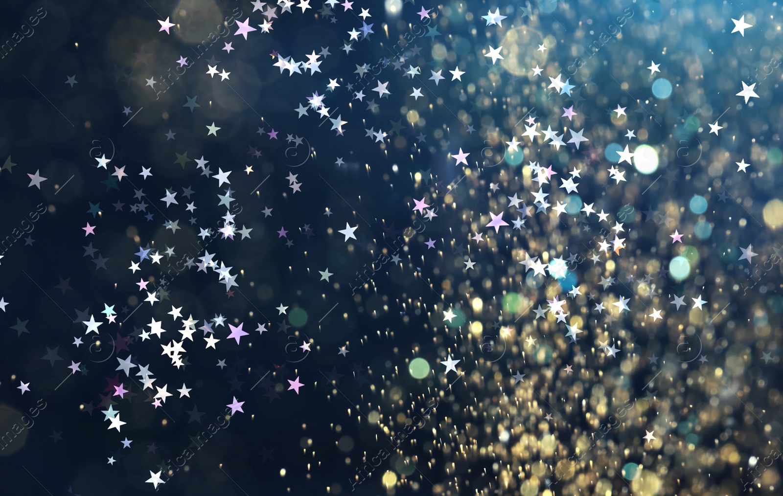 Image of Many beautiful shimmering stars and blurred lights on dark blue background. Bokeh effect