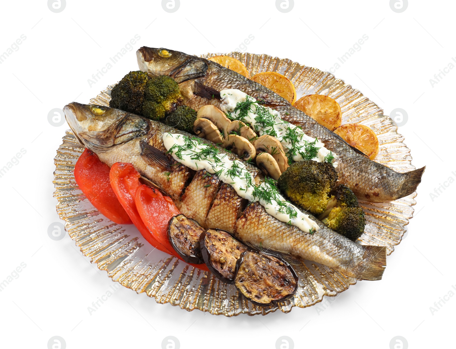 Photo of Plate with delicious sea bass fish and ingredients isolated on white