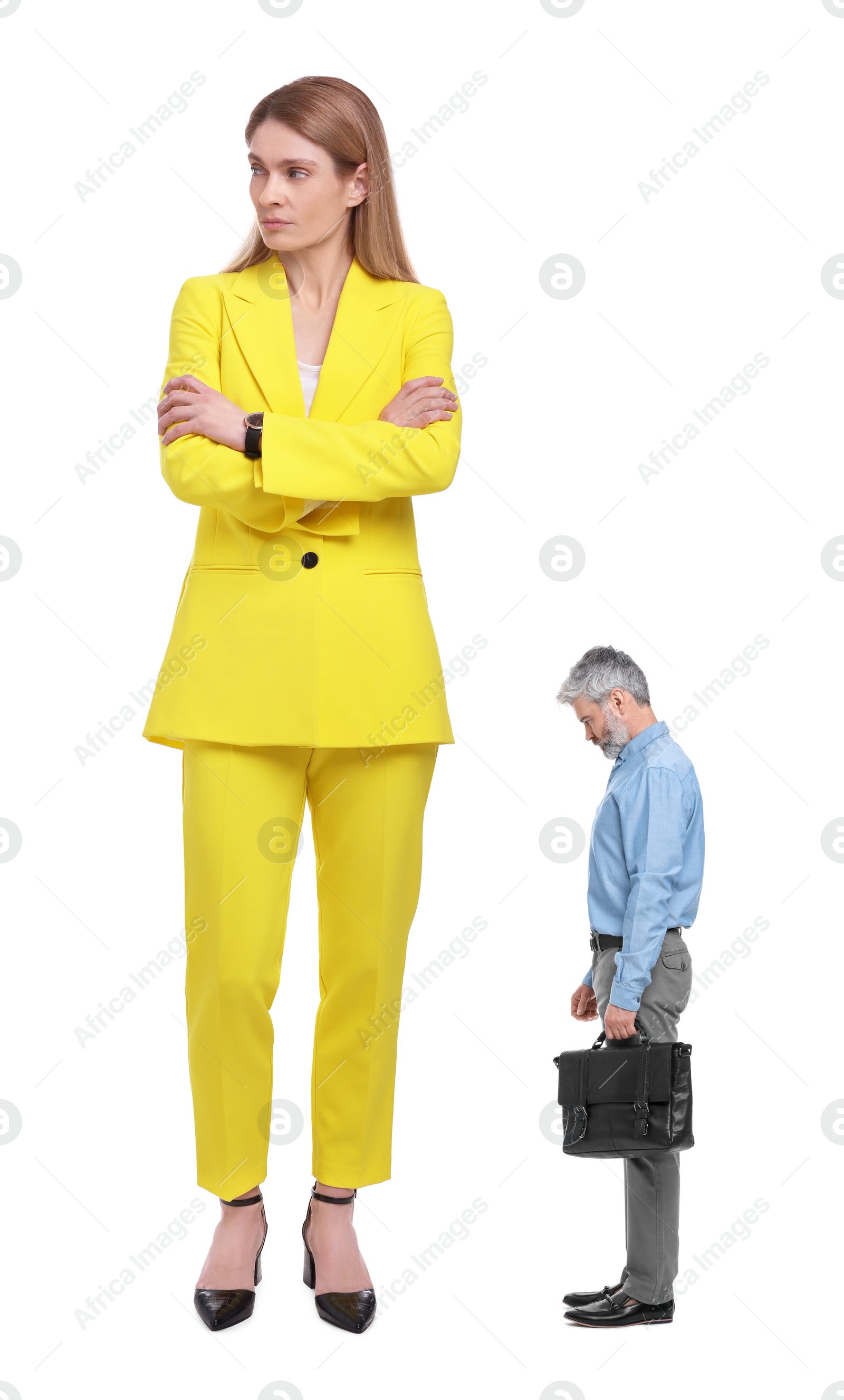 Image of Displeased giant woman and sad small man on white background